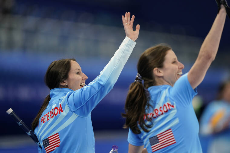 ASSOCIATED PRESS
                                The United States’ Tabitha Peterson waves to the crowd after a win against Russian Olympic Committee during a women’s curling match at the Beijing Winter Olympics on Thursday.