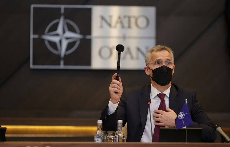 ASSOCIATED PRESS
                                NATO Secretary General Jens Stoltenberg banged a gavel to signify the start of a round table meeting of the North Atlantic Council at NATO headquarters in Brussels, today. NATO member countries today examined new ways to bolster the defenses of nations on the organization’s eastern flank as Russia’s military buildup around Ukraine fuels one of Europe’s biggest security crises in decades.