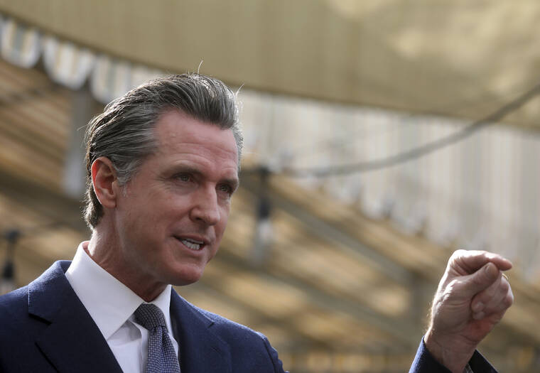 ARIC CRABB/BAY AREA NEWS GROUP VIA ASSOCIATED PRESS
                                California Gov. Gavin Newsom spoke at a press conference, Feb. 9, in Oakland, Calif. Newsom today announced the first shift by a state to an “endemic” approach to the coronavirus pandemic that emphasizes prevention and quick reactions to outbreaks over mandates, a milestone nearly two years in the making that harkens to a return to a more normal existence.