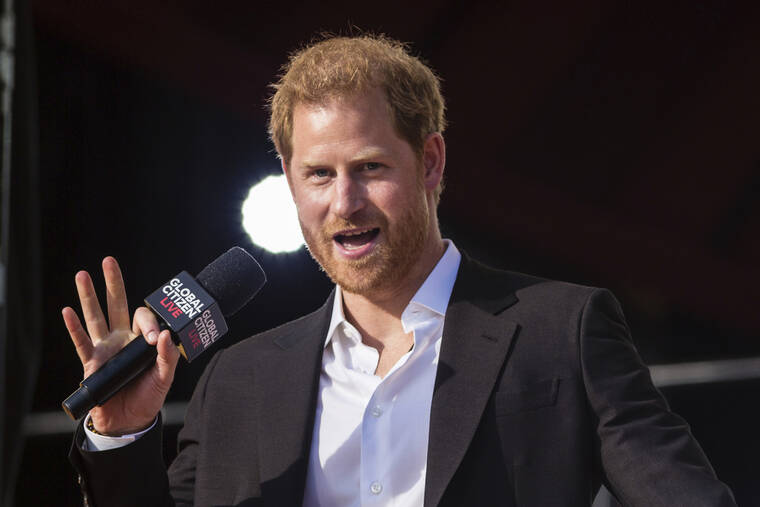 ASSOCIATED PRESS
                                Prince Harry, Duke of Sussex, spoke during the Global Citizen Festival, Sept. 25, in New York. Lawyers for Prince Harry told a court hearing today that the British royal is unwilling to bring his children to his homeland because it is not safe.