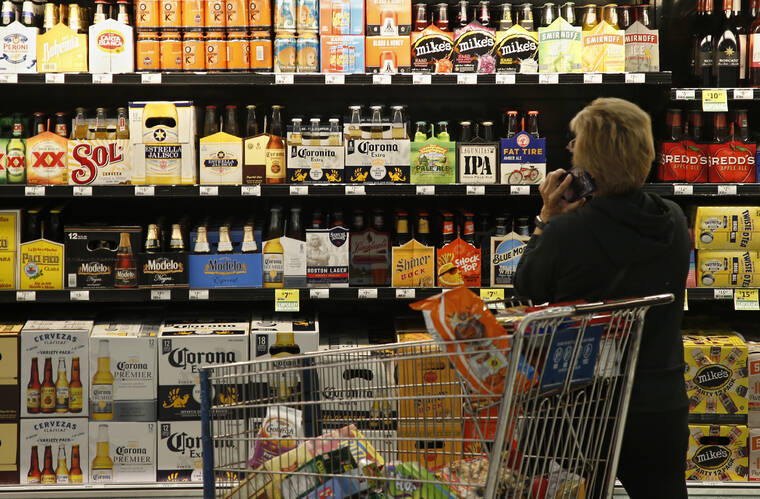 ASSOCIATED PRESS
                                A customer looked over the beer selection at Crest Foods in Oklahoma City in October 2018. In an effort to give smaller breweries a better chance at competing, the Treasury Department this month issued a report full of ideas on how to create a more competitive beer, wine and liquor market.