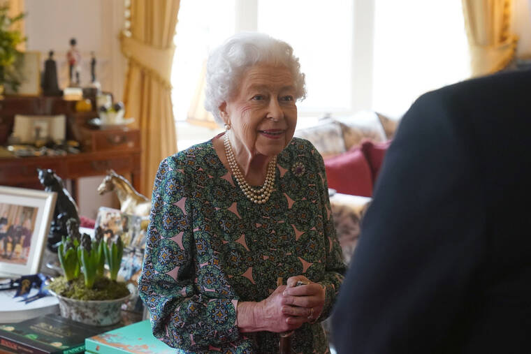 ASSOCIATED PRESS
                                Queen Elizabeth II speaks during an audience at Windsor Castle where she met the incoming and outgoing Defence Service Secretaries on Feb. 16. Buckingham Palace said today that Elizabeth tested positive for COVID-19, has mild symptoms and will continue with duties.