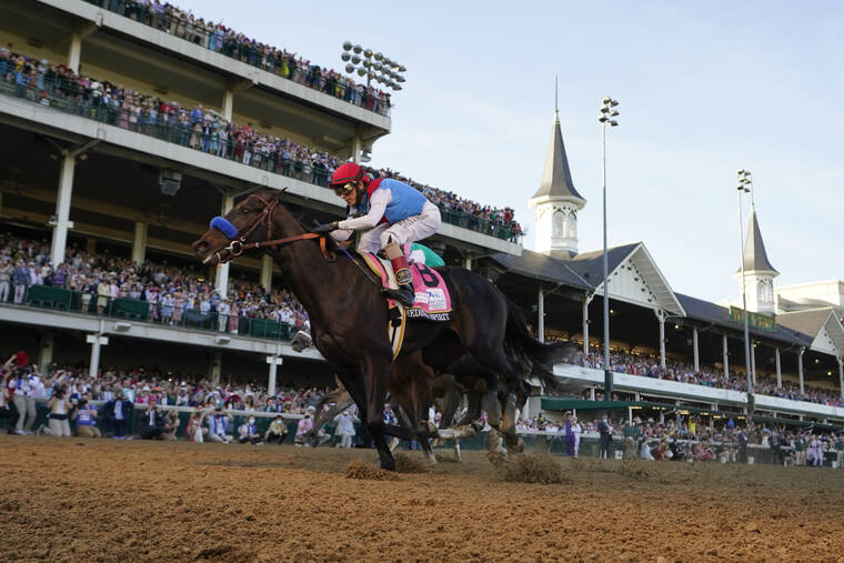 ASSOCIATED PRESS
                                John Velazquez riding Medina Spirit crosses the finish line to win the 147th running of the Kentucky Derby at Churchill Downs in Louisville, Ky., in this Saturday, May 1, 2021, file photo.