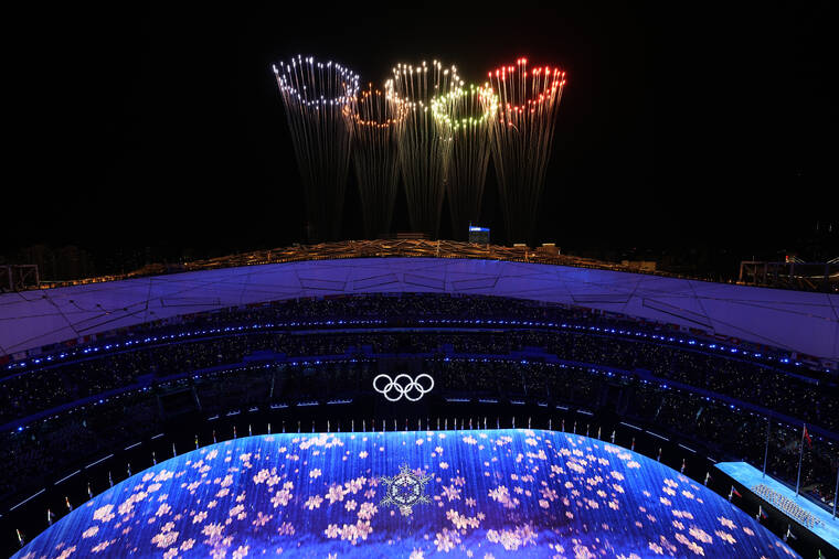 ASSOCIATED PRESS
                                Fireworks light up the sky over Olympic Stadium during the closing ceremony of the 2022 Winter Olympics on Sunday.