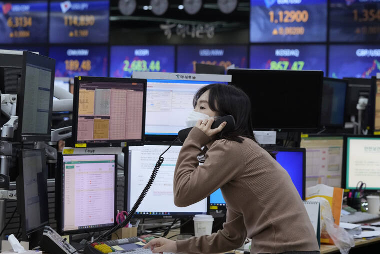 ASSOCIATED PRESS
                                A currency trader talked on the phone at the foreign exchange dealing room of the KEB Hana Bank headquarters in Seoul, South Korea, Thursday. An inflation gauge that is closely monitored by the Federal Reserve jumped 6.1% in January compared with a year ago, the latest evidence that Americans are enduring sharp price increases that will likely worsen after Russia’s invasion of Ukraine.