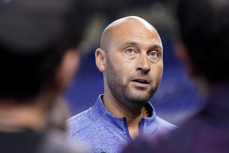 ASSOCIATED PRESS
                                Derek Jeter, CEO of the Miami Marlins, spoke with the news media before a baseball game against the Philadelphia Phillies, Oct. 2, in Miami. Derek Jeter announced a surprise departure from the Miami Marlins Monday, Feb. 28, 2022.