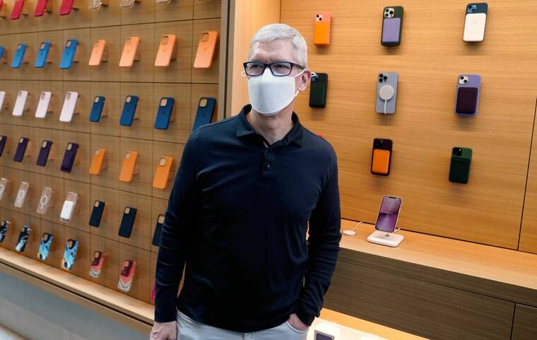 ASSOCIATED PRESS
                                Apple CEO Tim Cook stood in front of company products during a visit to an Apple Store at The Grove, Nov. 19, in Los Angeles. Apple’s vision of a more private web is not necessarily a more profitable one for internet companies that depend on advertising revenue.