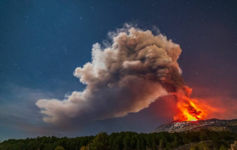 ASSOCIATED PRESS
                                Smoke billowed from the Mt. Etna volcano, as seen from Nicolosi, Sicily, southern Italy, Thursday.