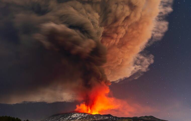 ASSOCIATED PRESS
                                Smoke billowed from the Mt. Etna volcano, as seen from Nicolosi, Sicily, southern Italy, Thursday.