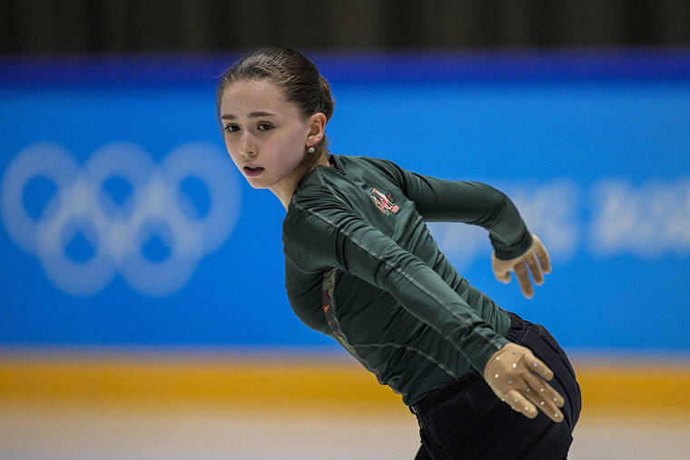 BERNAT ARMANGUE / AP
                                Kamila Valieva, of the Russian Olympic Committee, trains at the 2022 Winter Olympics, Saturday in Beijing.