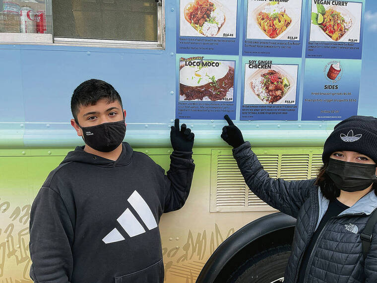 In December, Grant and Anya Hubbard of Mililani fueled up on some local vibes from a food truck before tackling the Filbert Street Steps in San Francisco. Photo by Michael Hubbard.