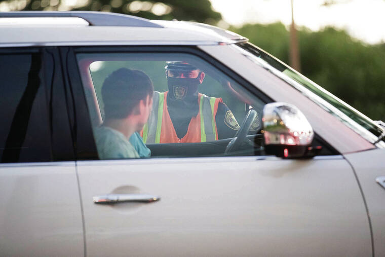 GEORGE F. LEE / JANUARY 2021
                                Honolulu police conducted a sobriety checkpoint in Kakaako near the site of a 2019 crash that killed three pedestrians.