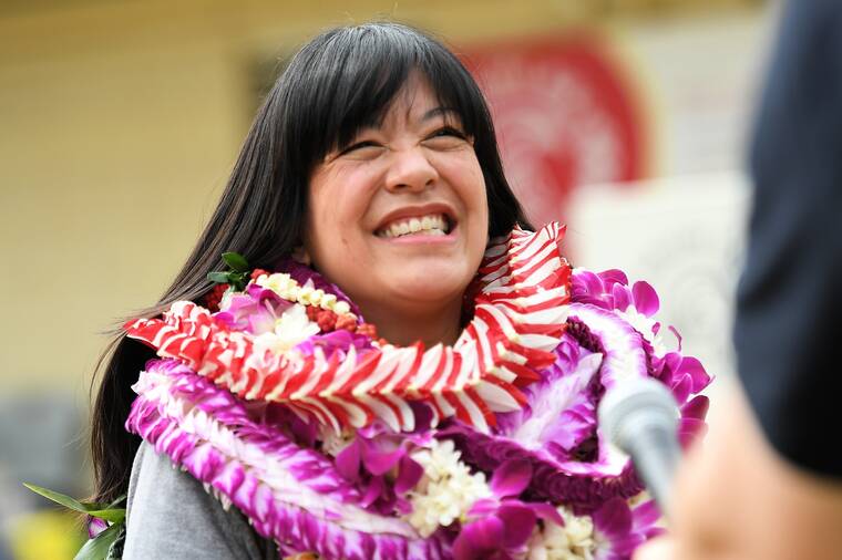 COURTESY PHOTO Michelle Le Iwasaki, an academic coach at Kalihi Kai Elementary School, received the $25,000 Milken Educator Award at a surprise outdoor assembly today.