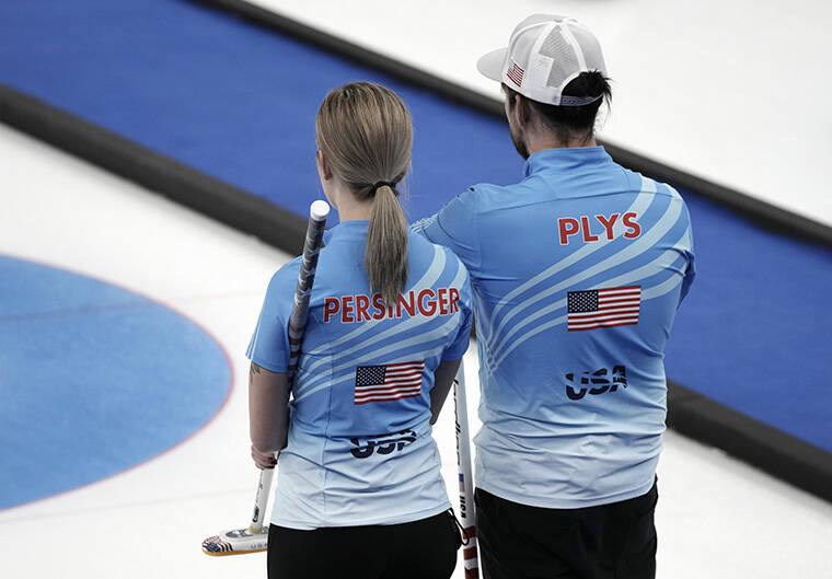 ASSOCIATED PRESS
                                The United States’ Christopher Plys and Victoria Persinger compete during their mixed doubles curling match against Australia.