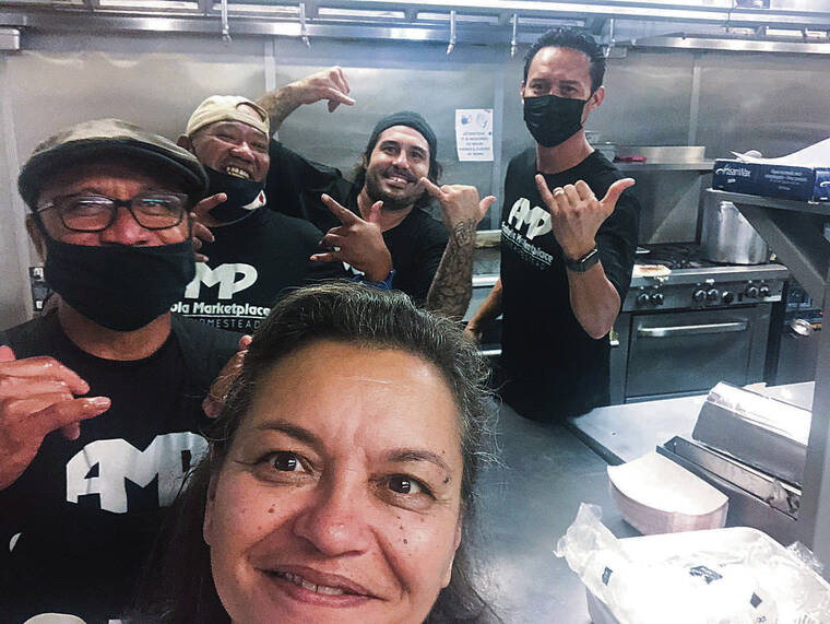 COURTESY HOMESTEAD COMMUNITY DEVELOPMENT CORP.
                                Workers and helpers Robin Danner, front, Norman Solomon, Kongi Faagai, Ikaika Kirifi and Wyatt Kamoku pose for a selfie in the Anahola Cafe kitchen.