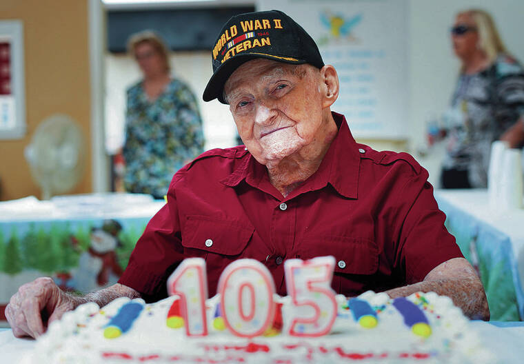 TAMPA BAY TIMES / DEC. 19
                                World War II veteran Bill Monfort celebrated his 105th birthday in December in Tampa, Fla. Momfort, who survived a bout of COVID-19 in July 2020, said that since he turned 100, he has received multiple birthday cakes each year.