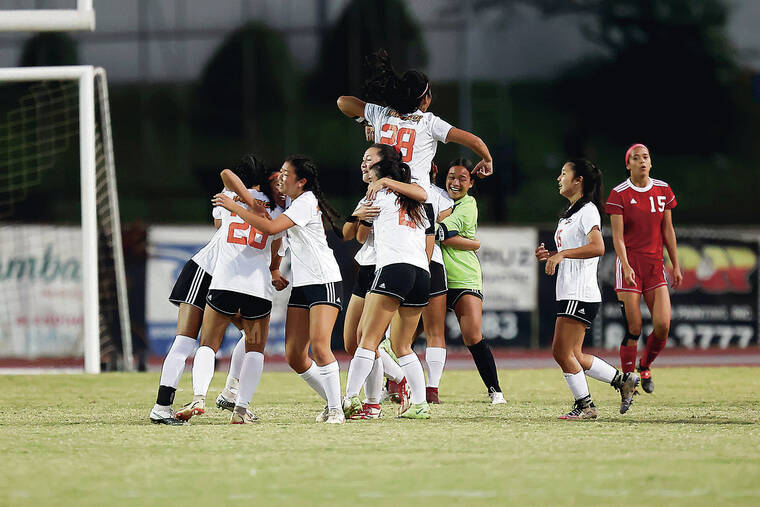 ANDREW LEE / SPECIAL TO THE STAR-ADVERTISER
                                Pac-Five celebrated after winning the HHSSA Division II Girls Soccer Championship Game 1-0 over Kauai on Saturday.