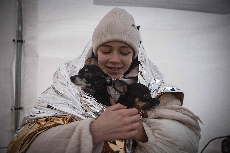 Pets in tow as Ukrainians flee war zone 97 AP22069593179346