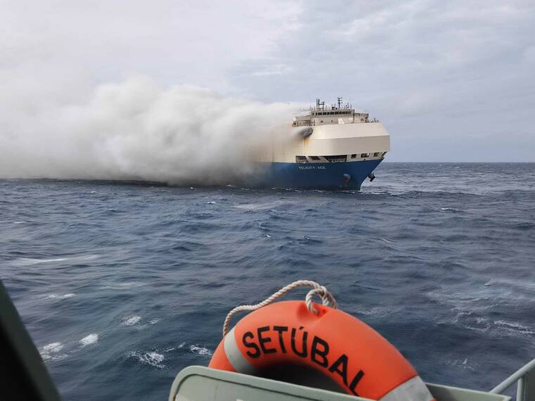 PORTUGUESE NAVY VIA ASSOCIATED PRESS
                                Smoke billowed from the burning Felicity Ace car transport ship, Feb. 18, as seen from the Portuguese Navy NPR Setubal ship southeast of the mid-Atlantic Portuguese Azores Islands. A large cargo vessel carrying cars from Germany to the United States sank today in the mid-Atlantic, 13 days after a fire broke out on board, the ship’s manager and the Portuguese navy said.