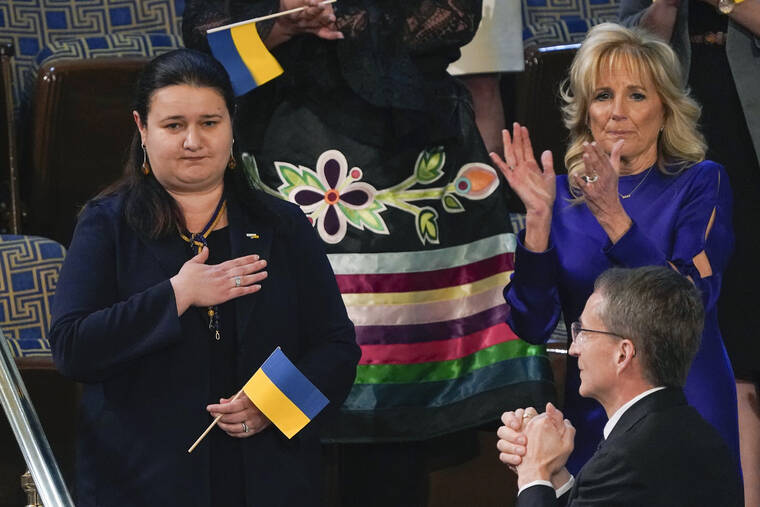 ASSOCIATED PRESS
                                Ukraine Ambassador to the United States, Oksana Markarova, acknowledges President Joe Biden as first lady Jill Biden applauds during his first State of the Union address to a joint session of Congress.