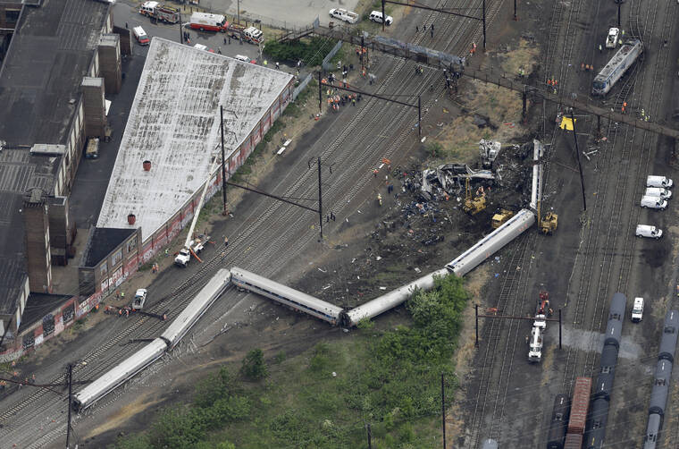 ASSOCIATED PRESS
                                Emergency personnel worked at the scene of a derailment in Philadelphia of an Amtrak train headed to New York in May 2015. An Amtrak engineer was cleared of charges related to a deadly, high-speed derailment that left eight people dead and hundreds injured in Philadelphia in 2015.