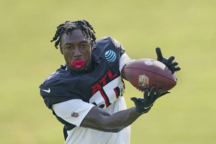 ASSOCIATED PRESS
                                Atlanta Falcons wide receiver Calvin Ridley made a catch during the team’s NFL training camp football practice, Aug. 9, in Flowery Branch, Ga. Ridley has been suspended for the 2022 season for betting on NFL games in the 2021 season.