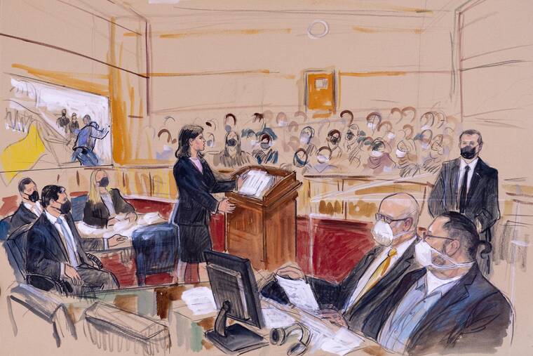 DANA VERKOUTEREN VIA ASSOCIATED PRESS
                                This artist sketch depicts Guy Wesley Reffitt, bottom right, joined by his lawyer William Welch, third from right, listening as prosecutor Risa Berkower, speaks at the podium at center, as a video depicts a handgun on the waist of Reffitt, at left, for members of the jury and audience in Federal Court, in Washington, Monday.