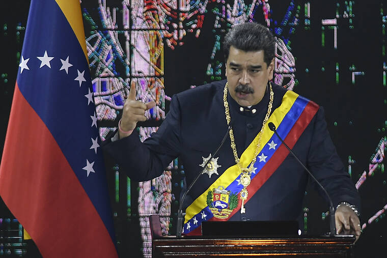 ASSOCIATED PRESS / JAN. 27
                                Venezuelan President Nicolas Maduro speaks during a ceremony marking the start of the judicial year at the Supreme Court in Caracas.