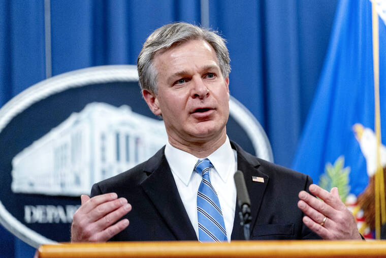 ASSOCIATED PRESS / NOV. 8
                                FBI Director Christopher Wray speaks at a news conference at the Justice Department in Washington. Companies critical to U.S. national interests will have to report when they’re hacked or they pay ransomware. The new rules approved by Congress are part of a broader effort by the Biden administration and Congress to shore up the nation’s cyberdefenses after a series of high-profile digital espionage campaigns and disruptive ransomware attacks.