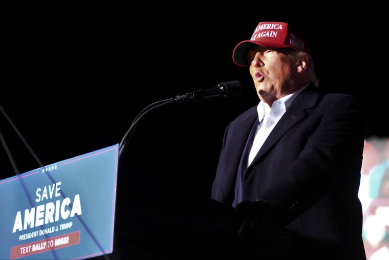 ASSOCIATED PRESS
                                Former President Donald Trump spoke at a rally, Saturday, in Florence, S.C. As former President Donald Trump continues to tease a future White House bid, a pro-Democratic super PAC has accused him of violating federal campaign laws by raising and spending money for a run without officially filing his candidacy.