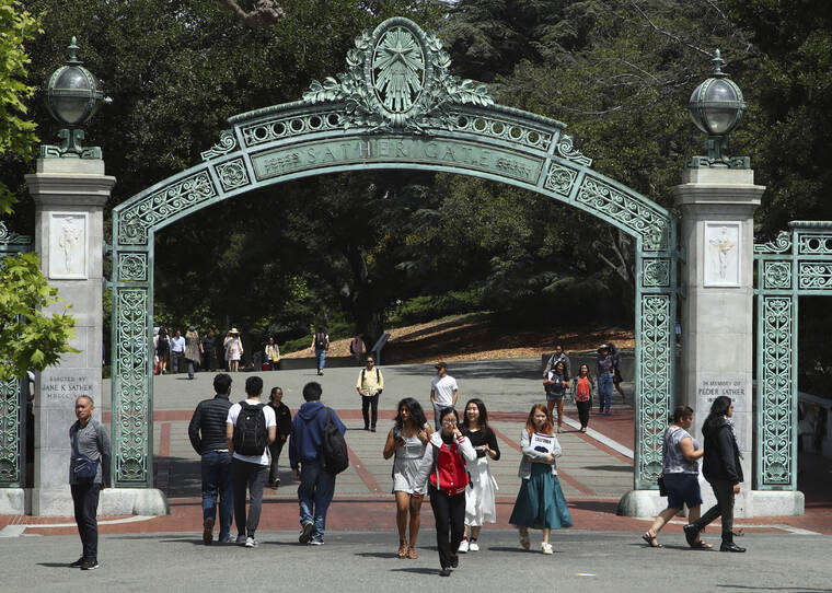 ASSOCIATED PRESS
                                Students walked past Sather Gate on the University of California at Berkeley campus in Berkeley, Calif., in May 2018. The California Legislature voted unanimously today to overturn a recent court ruling that would have forced one of the nation’s most prestigious universities to turn away thousands of students from its incoming freshman class.