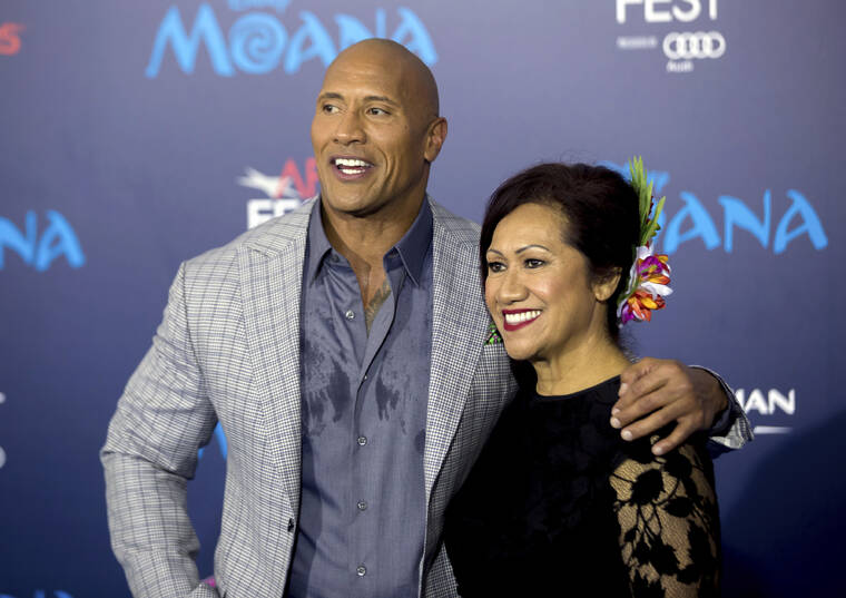WILLY SANJUAN/INVISION/ASSOCIATED PRESS
                                Dwayne Johnson, left, and his mother Ata Johnson appeared at the 2016 AFI Fest - “Moana” premiere in Los Angeles in November 2016. Johnson credits the women in his life including his ex-wife and business partner Dany Garcia, his wife Lauren, mother Ata, and three daughters for making him who he is.