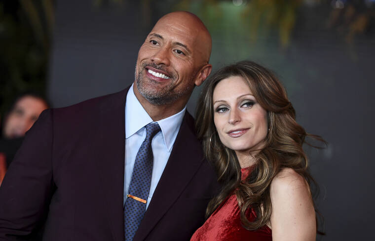 JORDAN STRAUSS/INVISION/ASSOCIATED PRESS
                                Dwayne Johnson and his wife Lauren Hashian appeared at the Los Angeles premiere of “Jumanji: Welcome to the Jungle” in December 2017. Johnson credits the women in his life including his business partner and ex-wife Dany Garcia, his wife Lauren, mother Ata, and three daughters for making him who he is.
