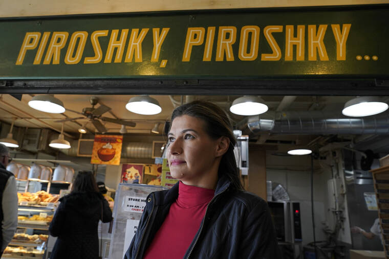 ASSOCIATED PRESS
                                Olga Sagan, the owner of Russian bakery Piroshky Piroshky, poses for a photo in front of her business at Pike Place Market in Seattle, where a recent caller threatened to stage a terrorist attack on the store. Angered by the deadly violence and the humanitarian crisis resulting from Russia’s war on Ukraine, some people are taking it out on Russian businesses and brands in the U.S. and business owners and experts say it’s the most intense anti-Russian sentiment they’ve seen to date.