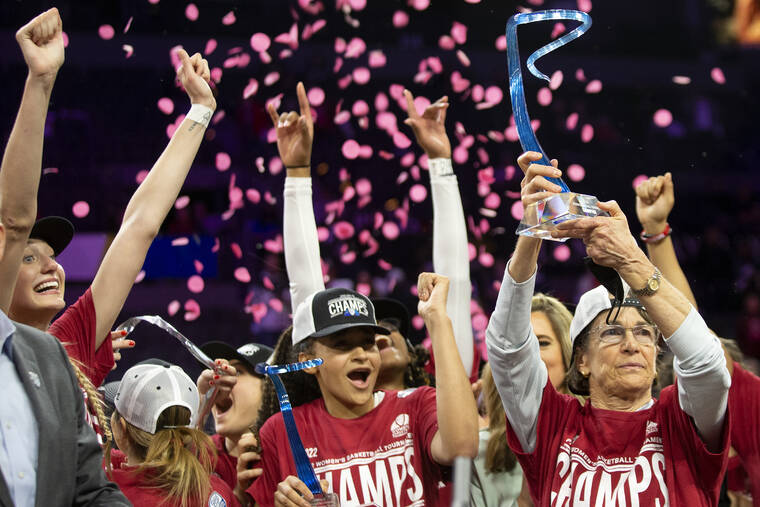 ASSOCIATEDPRESS
                                Stanford head coach Tara VanDerveer, right, holds up the championship trophy while her team cheers after they won the Pac-12 tournament championship against Utah on March 6.
