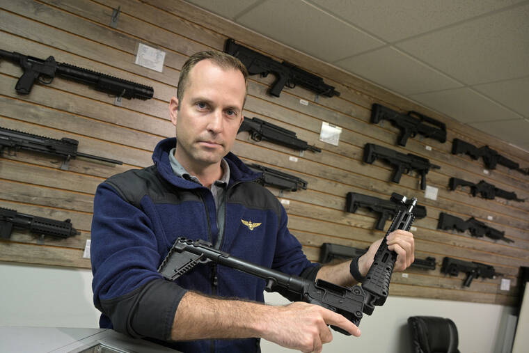 ASSOCIATED PRESS
                                Adrian Kellgren, director of industrial production of KelTec, held a 9mm SUB2000 rifle, similar to ones being shipped to Ukraine, at their manufacturing facility, Thursday, in Cocoa, Fla. Kellgren’s family-owned gun company was left holding a $200,000 shipment of semi-automatic rifles after a longtime customer in Odessa suddenly went silent during Vladimir Putin’s invasion of Ukraine.