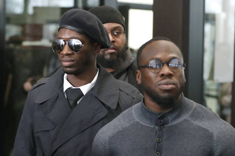 ASSOCIATED PRESS / 2020
                                Brothers Olabinjo Osundairo, right, and Abimbola Osundairo, appear outside the Leighton Criminal Courthouse in Chicago. A U.S. District Judge in Chicago ruled Friday, March 18, that an attorney for Jussie Smollett might have defamed the two Black brothers who testified that they participated in a fake racist and homophobic attack on the actor when she suggested they had been wearing “whiteface.”