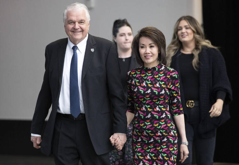 ASSOCIATED PRESS
                                Nevada Gov. Steve Sisolak arrives with his wife, Kathy, to deliver his State of the State address at Allegiant Stadium in Las Vegas on Feb. 23. Sisolak says he doesn’t want two men prosecuted for accosting him and his family at a Las Vegas restaurant in February, shouting profanities, taunts and anti-government statements in video posted on the internet. In a statement, Sisolak said he was outraged but doesn’t want to, in his words, fuel or glorify anger and violence.
