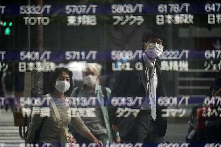 ASSOCIATED PRESS
                                People were reflected on a blank electronic stock board supposedly showing Japan’s Nikkei 225 index at a securities firm, in October 2020, in Tokyo. The scandal at a top Japanese brokerage widened as the vice president of SMBC Nikko Securities was arrested Thursday, and the company was charged with stock manipulation.