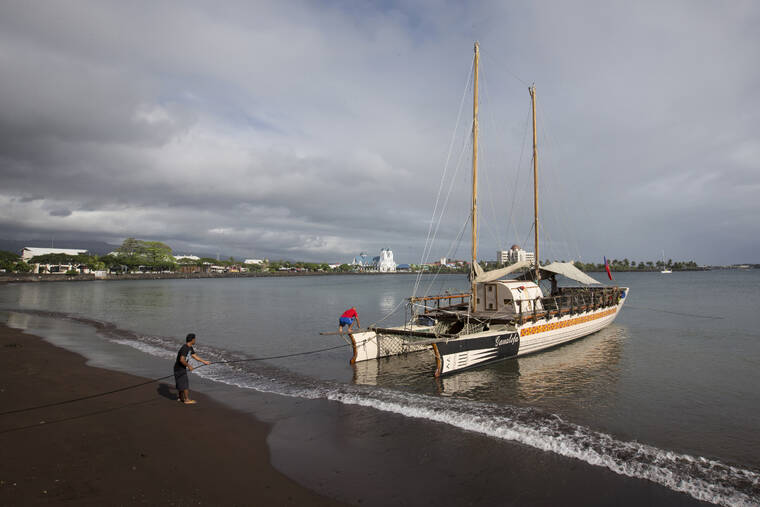 NEW ZEALAND HERALD VIA AP / JULY 2015
                                Samoa has reported scores of new COVID-19 cases each day since detecting its first case of community transmission last week. The South Pacific island nation of 200,000 people has been in lockdown since Saturday as it deals with its first outbreak of the pandemic. This photo shows a boat in Apia, Samoa, in 2015.
