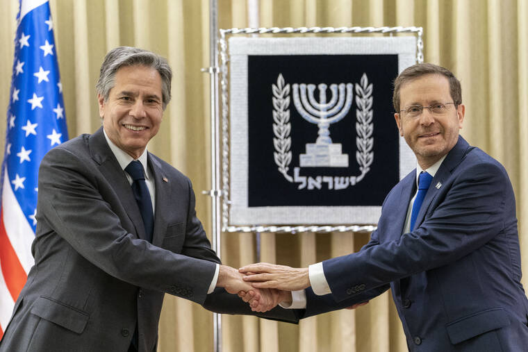ASSOCIATED PRESS
                                U.S. Secretary of State Antony Blinken, left, and Israel’s President Isaac Herzog pose for a photo as they meet at the Presidency today.
