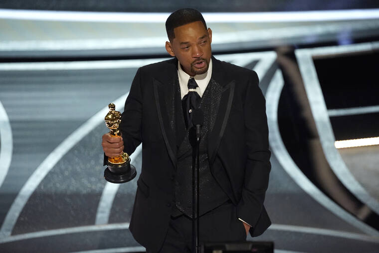 ASSOCIATED PRESS
                                Will Smith cried as he accepted the award for best performance by an actor in a leading role for “King Richard” at the Oscars, Sunday, at the Dolby Theatre in Los Angeles.