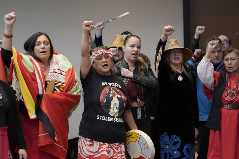 ASSOCIATED PRESS
                                Monie Ordonia, second from left, of the Tulalip Indian Tribe, joined others in singing an honor song after Washington Gov. Jay Inslee signed a bill that creates a first-in-the-nation statewide alert system for missing Indigenous people — particularly women, today, in Quil Ceda Village, near Marysville, Wash., north of Seattle. The law creates a system similar to Amber Alerts, which are used for missing children in many states.
