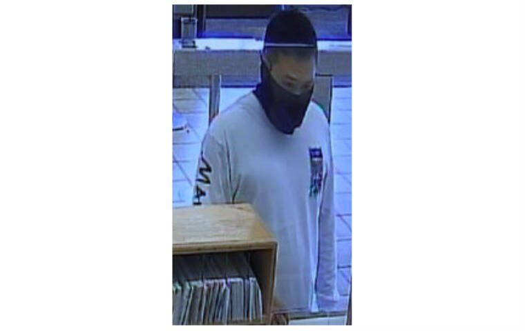 COURTESY CRIMESTOPPERS Honolulu police are looking for a suspect who is wanted for second-degree robbery of an American Savings Bank branch in Haleiwa.
