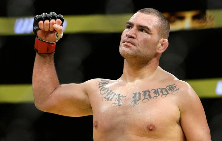 ASSOCIATED PRESS
                                Cain Velasquez celebrated after defeating Travis Browne during their heavyweight mixed martial arts bout at UFC 200, in July 2016, in Las Vegas.