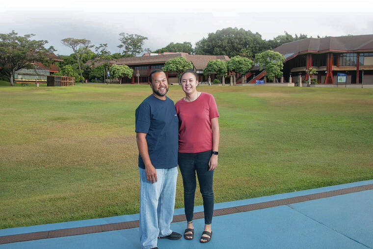 CRAIG T. KOJIMA / CKOJIMA@STARADVERTISER.COM
                                Kapilialoha Kidder, right, is an alumna of the Lunalilo Scholars program. Her experience inspired her dad, pictured with her Friday at Kapiolani Community College, to apply, and he was accepted.