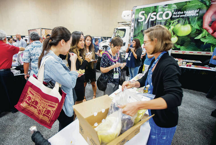 STAR-ADVERTISER / 2019
                                The Hawai‘i Hotel & Restaurant Show will be held Wednesday and Thursday in the Hawai‘i Convention Center. The event, which debuted in 2019, showcases a variety of products. Dana Shapiro, right, passed out breadfruit and Okinawan potato samples at the inaugural event.