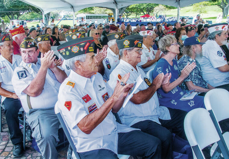 CRAIG T. KOJIMA / CKOJIMA@STARADVERTISER.COM
                                An in-person ceremony to mark National Vietnam War Veterans Day was held Tuesday at the National Memorial Cemetery of the Pacific at Punchbowl.