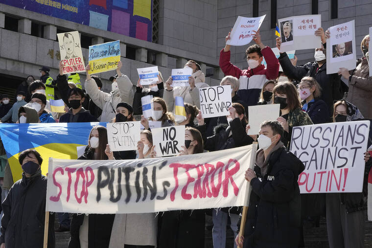 ASSOCIATED PRESS
                                People stage a rally calling for Russia to stop the war against Ukraine in Seoul, South Korea, on Saturday.