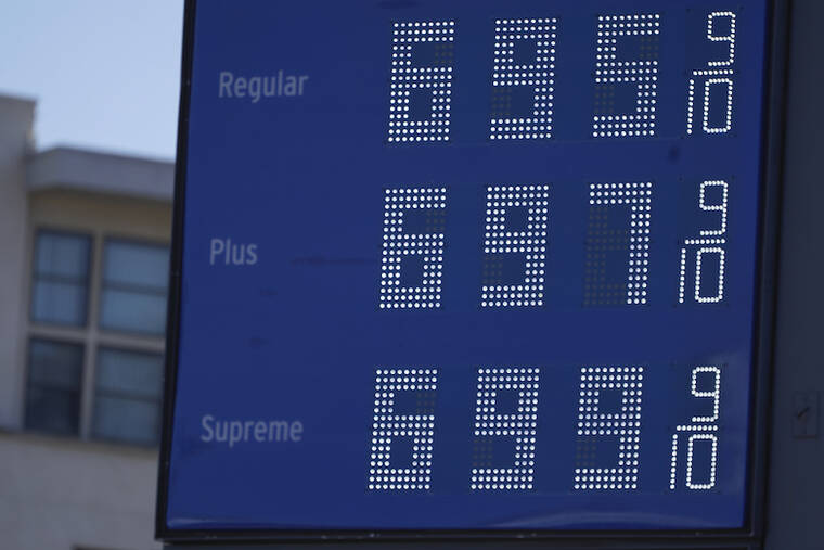 ASSOCIATED PRESS / MARCH 7
                                High gas prices are posted at a gas station in downtown Los Angeles, Calif. The price of regular gasoline broke $4 per gallon on average across the U.S. on Sunday for the first time since 2008.